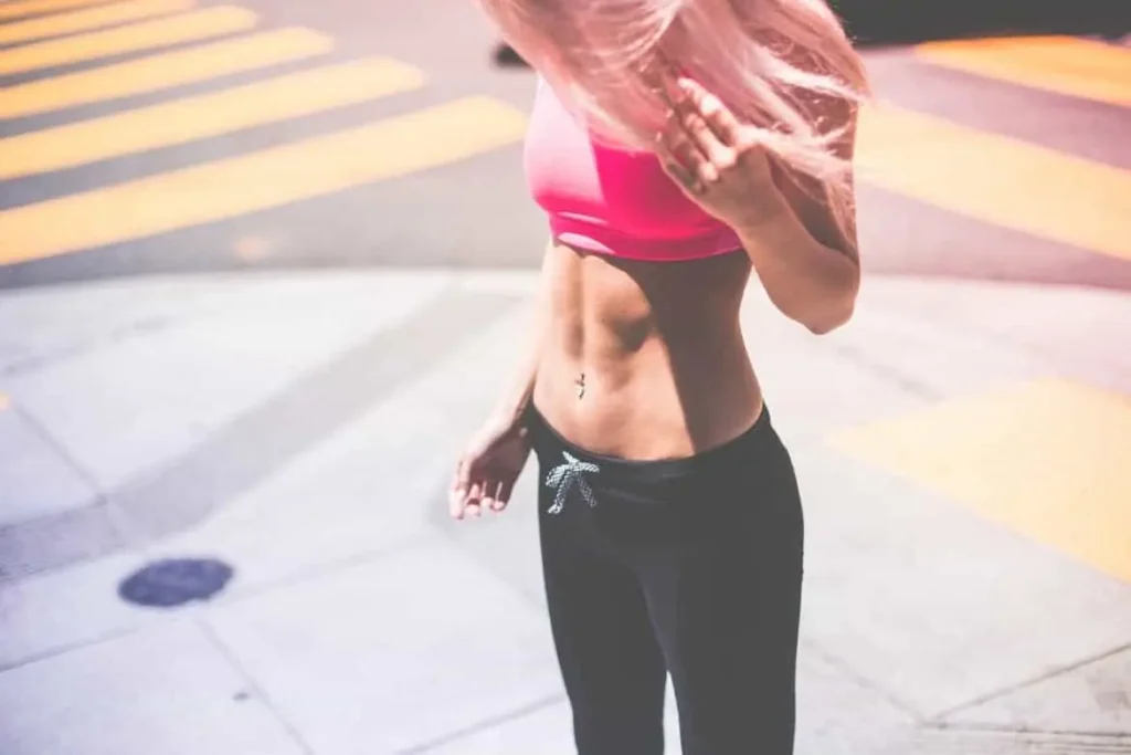 Woman with toned stomach after LA-EMS Body Sculpting Treatment Bexley 
